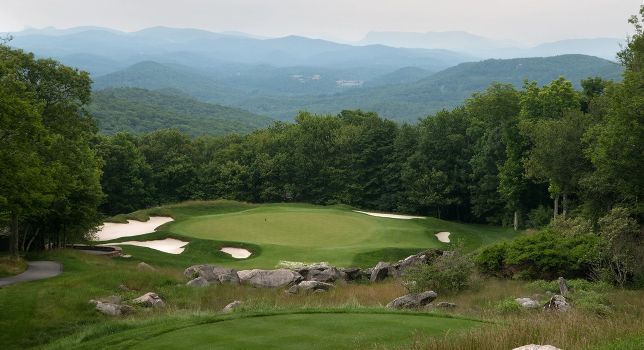 aerial of the golf course at Linville Ridge with the mountains
