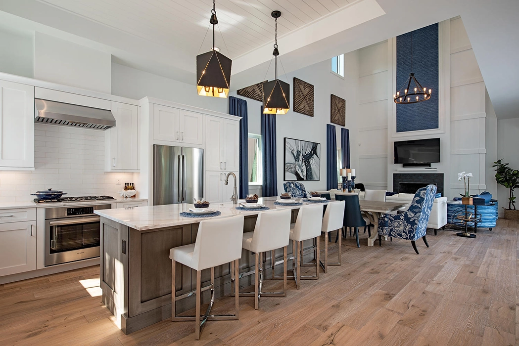 large kitchen with island open to the living room at Residences at Mercato
