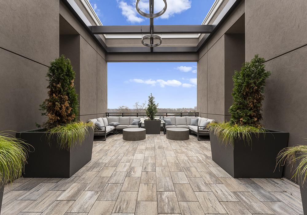 Modern outdoor terrace with seating and planters